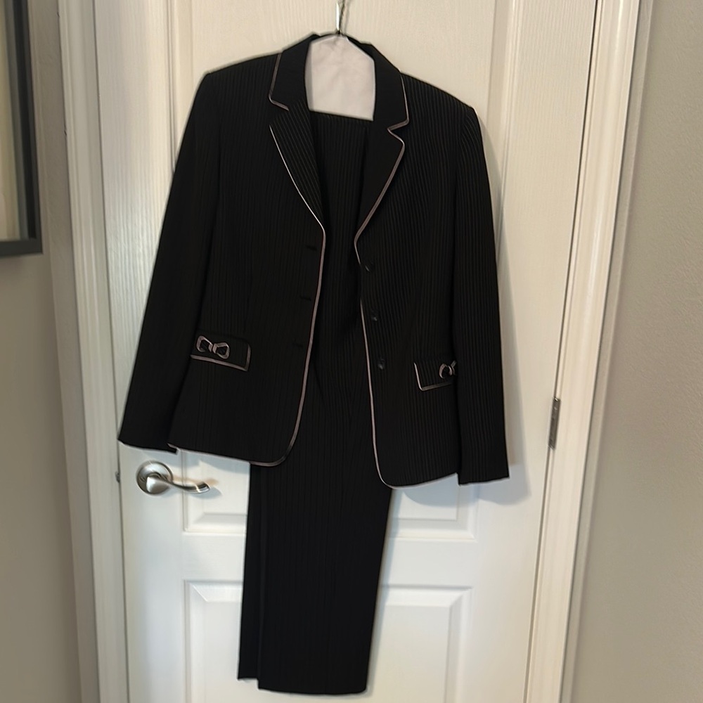 Elegant Black with pink pinstripe suit.  Includes suit jacket and pants